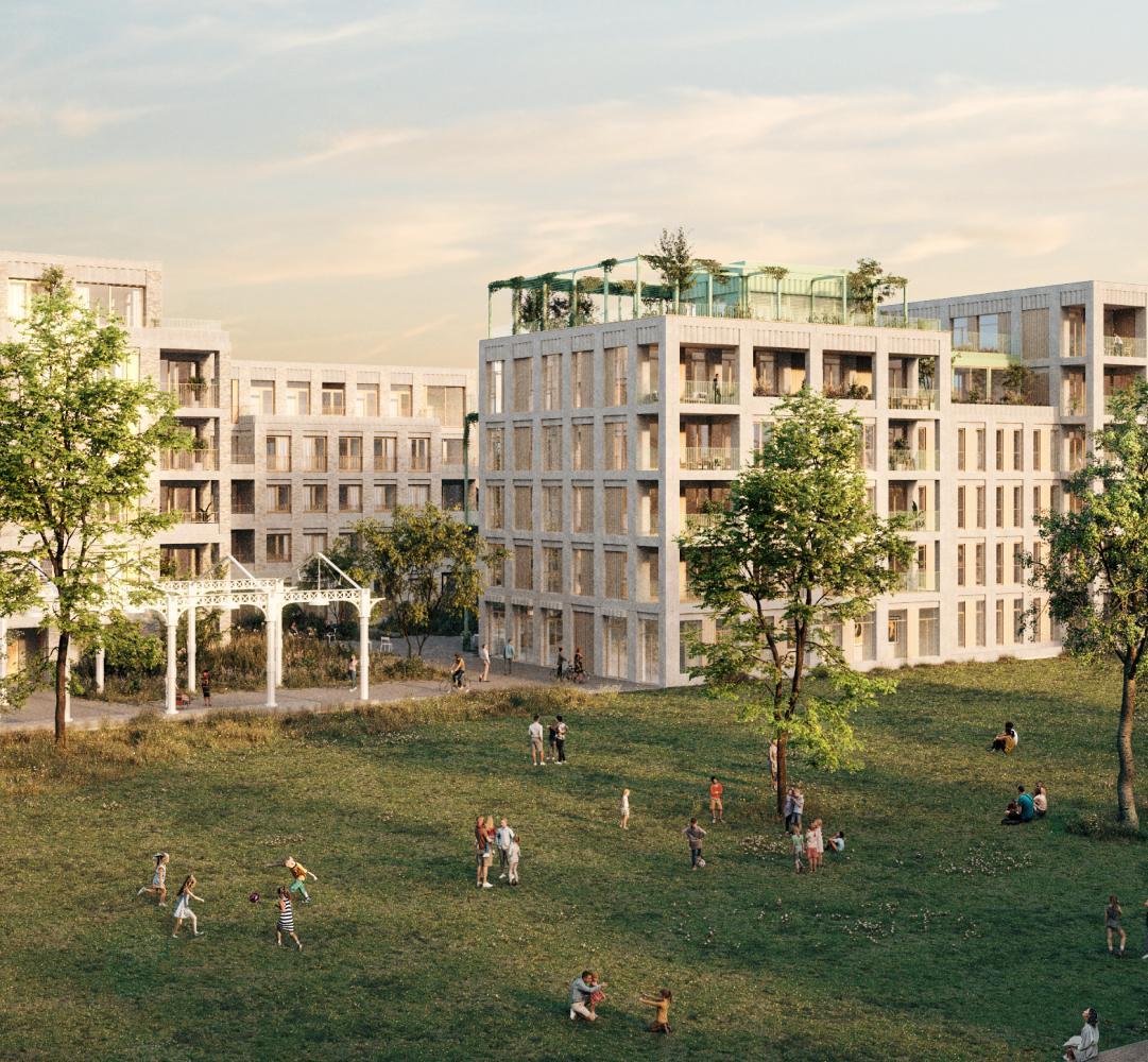 groen inkomplein met zicht op het cohousing gebouw Compagnie en het gebouw Orangerie.